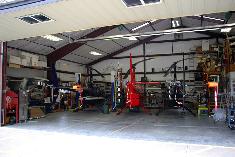Midwest Aeronautical hangar building with three R44 helicopters